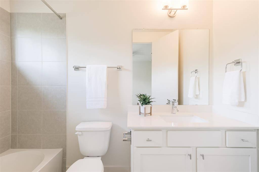 First floor full bath with walk in closet.