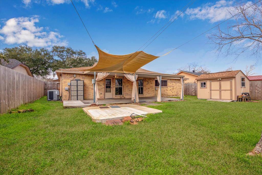 10x10 concrete pad with SunSail shading screens. Also has 3 gates. One on each side and one on back fence. A/C is well maintained and serviced twice yearly.