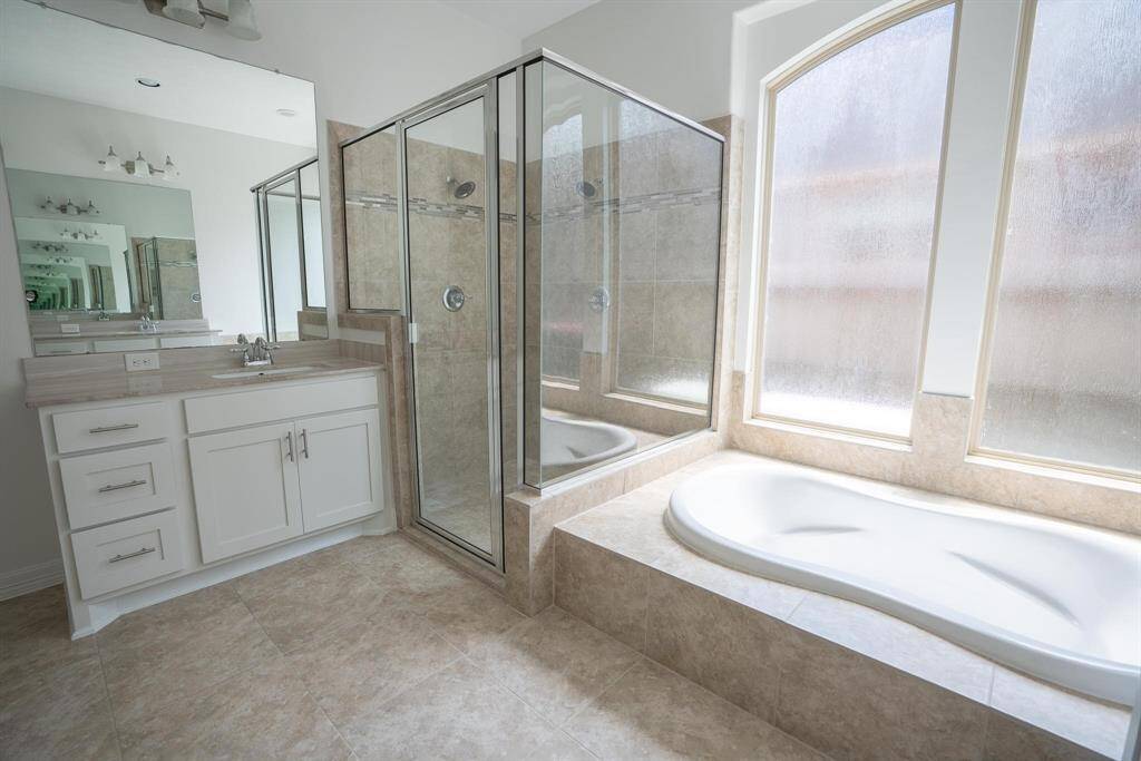Primary bathroom soaking tub and shower