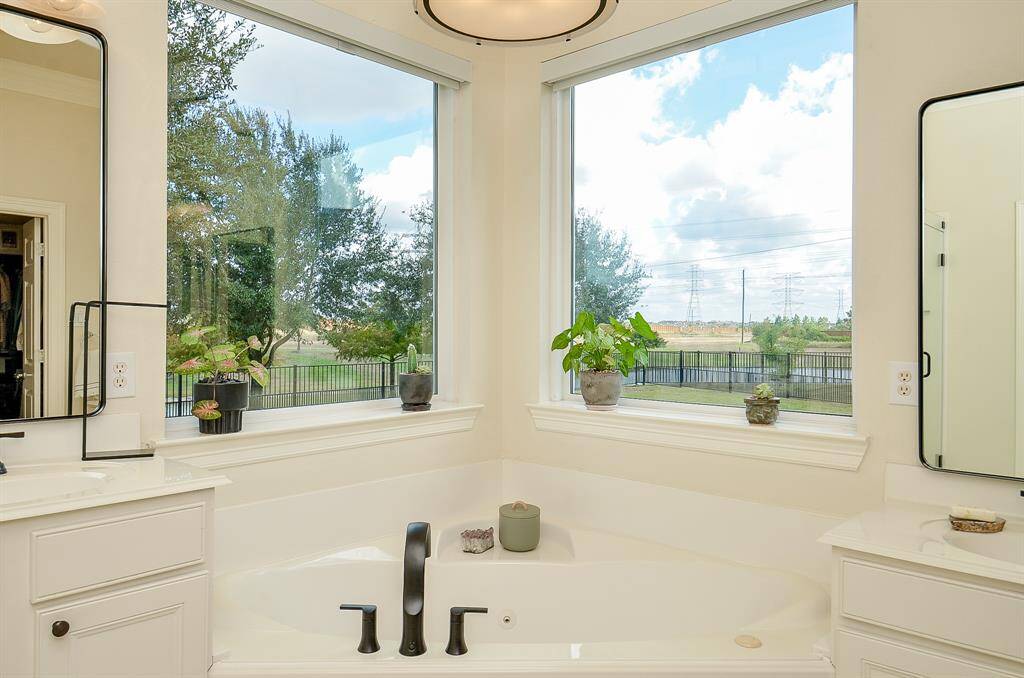 With a new 40-gallon Rheem water heater installed in 2023, you won't run out of hot water as you soak in this luxurious jetted garden tub.