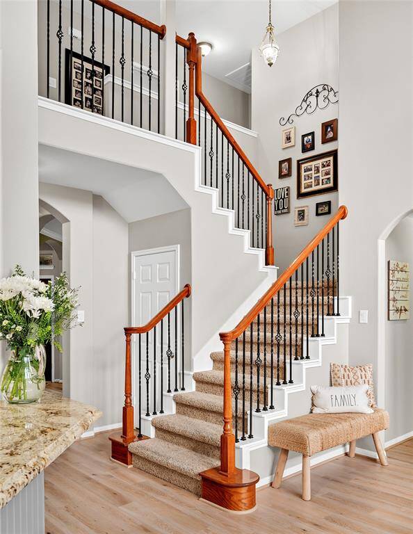 Open staircase for dramatic affect of the family room.
