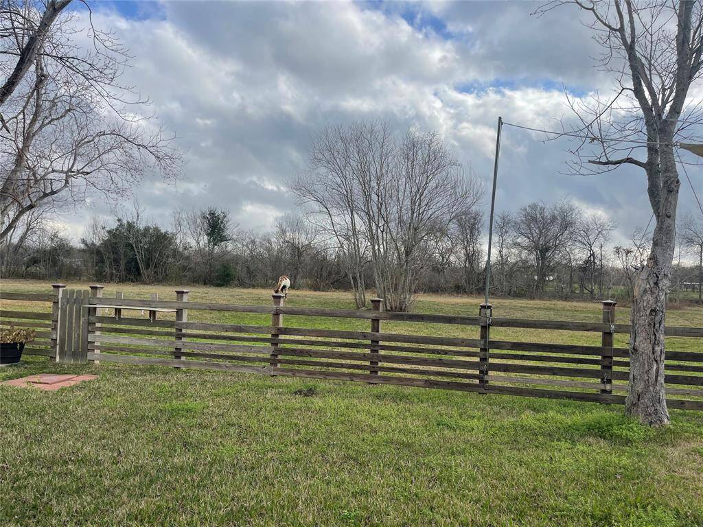 Property beyond the fence has a different owner.