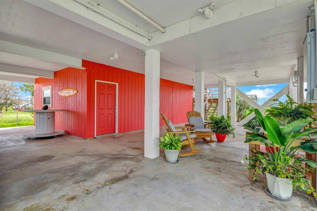 Great space for entertaining and storage under the home, including a 1 car garage with 1/2 bath