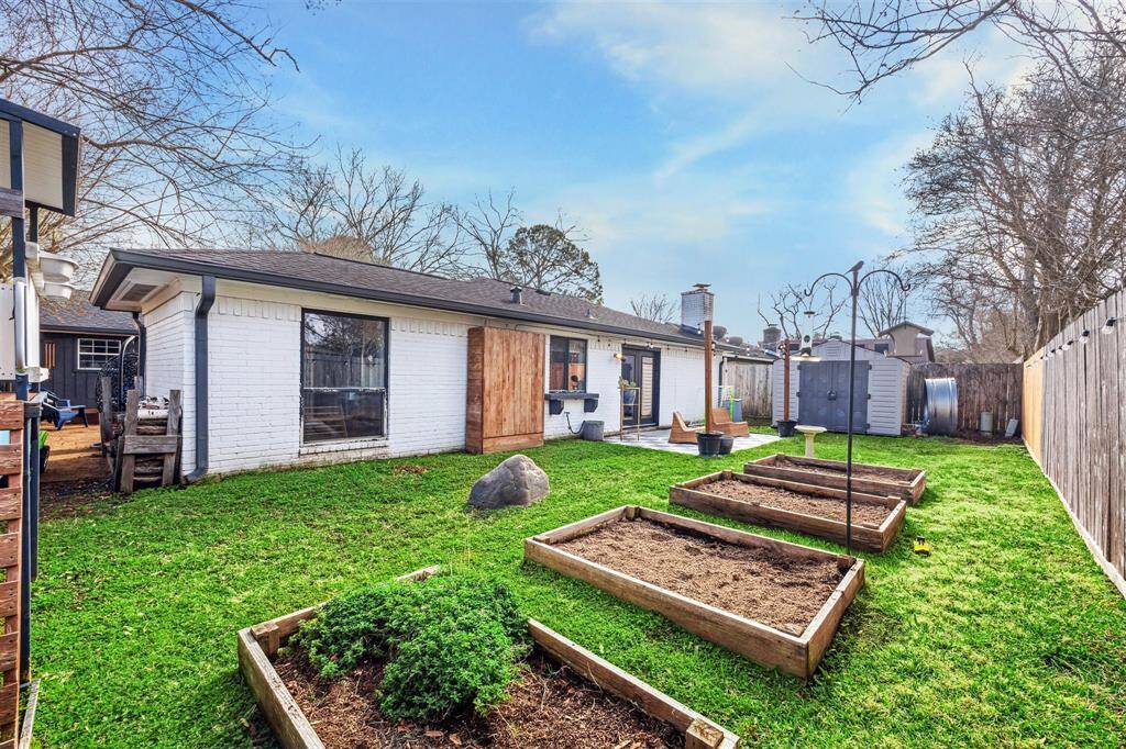 The homeowners enjoy gardening. Plenty of space for whatever you choose. The spacious storage building offers more space to store away whatever you choose.