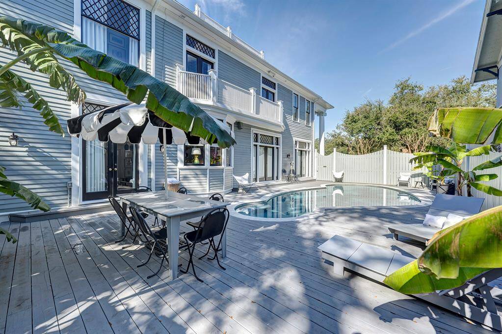 This inviting pool area is a tranquil retreat, designed for relaxation and fun in the sun. The sparkling pool is surrounded by a spacious deck, perfect for lounging on comfortable chairs or soaking up the sun.