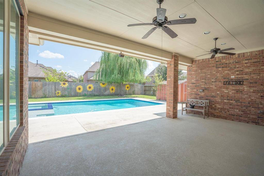 Oversized covered patio perfect for hosting guests!