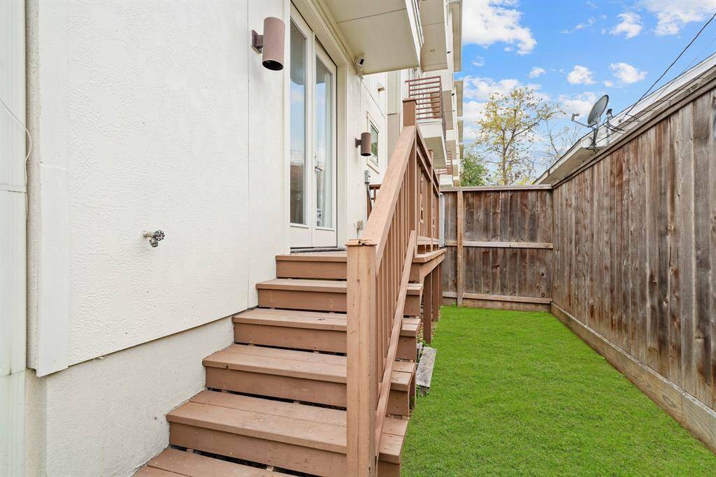 Fully fenced with space for child and/or pet play areas, the backyard includes a 10' covered patio accessible from the first floor bedroom.