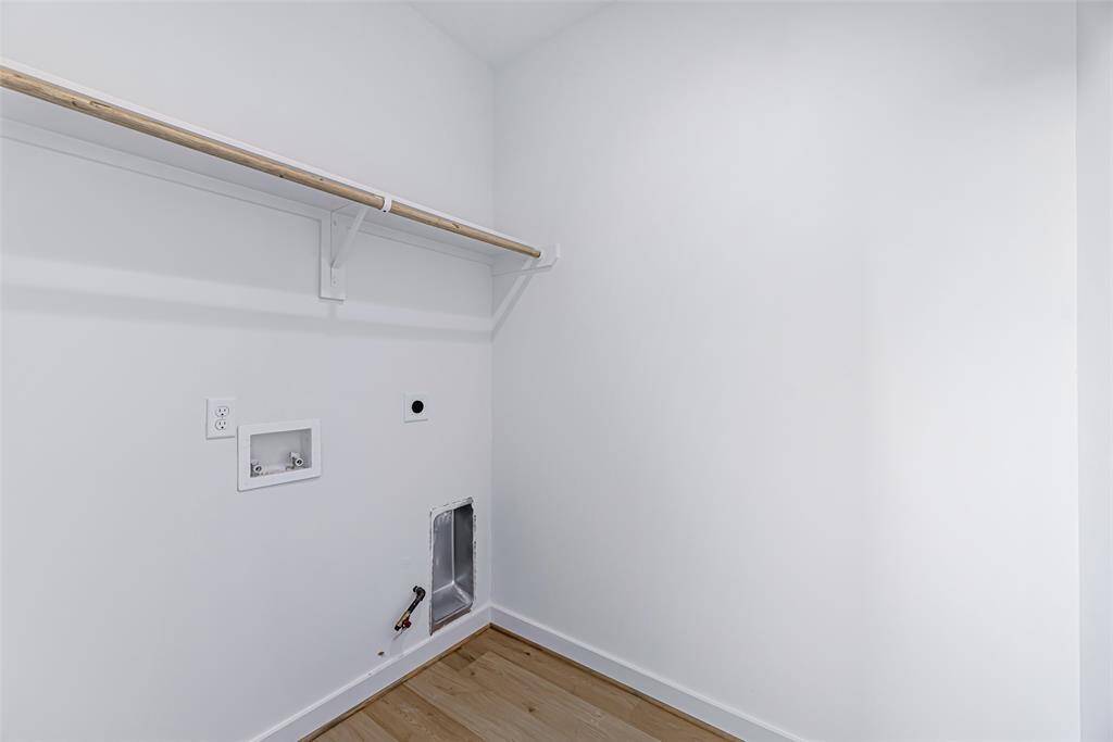Utility room next to the primary bedroom