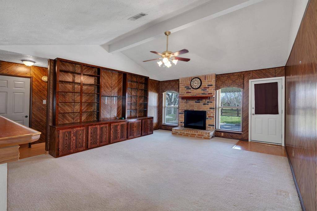 Spacious living area! Fireplace is propane. Windows are double pane.