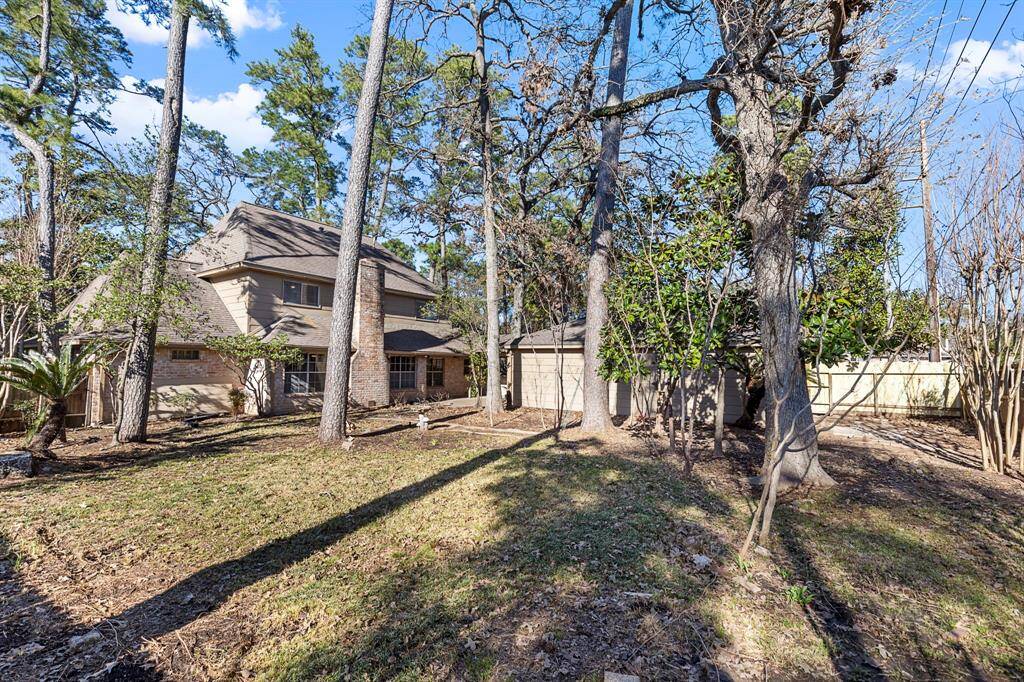 Expansive backyard with mature tress!