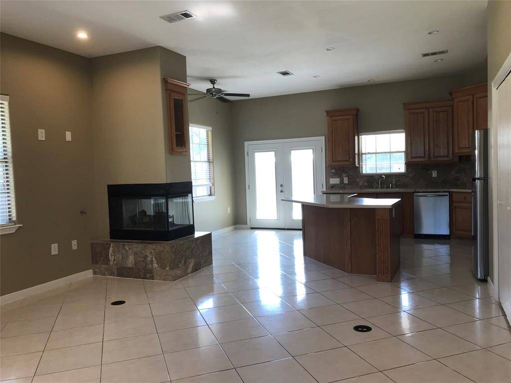 The kitchen is open to the living and dining area.