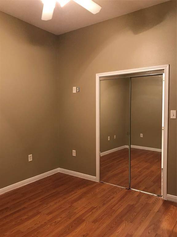 Guest bedroom with a shared closet.