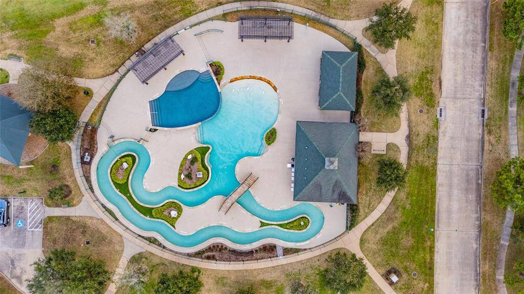 Neighborhood lazy river/pool, just steps from this property.  Walk or bike to the fun!