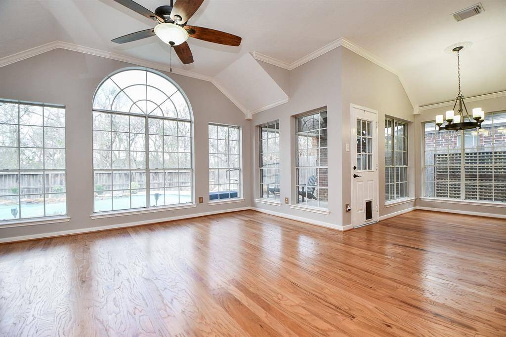 Walls of windows to let natural light in and view the pool!
