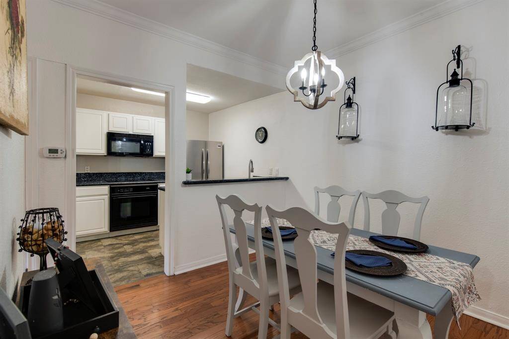 Kitchen overlooks the formal dining room.