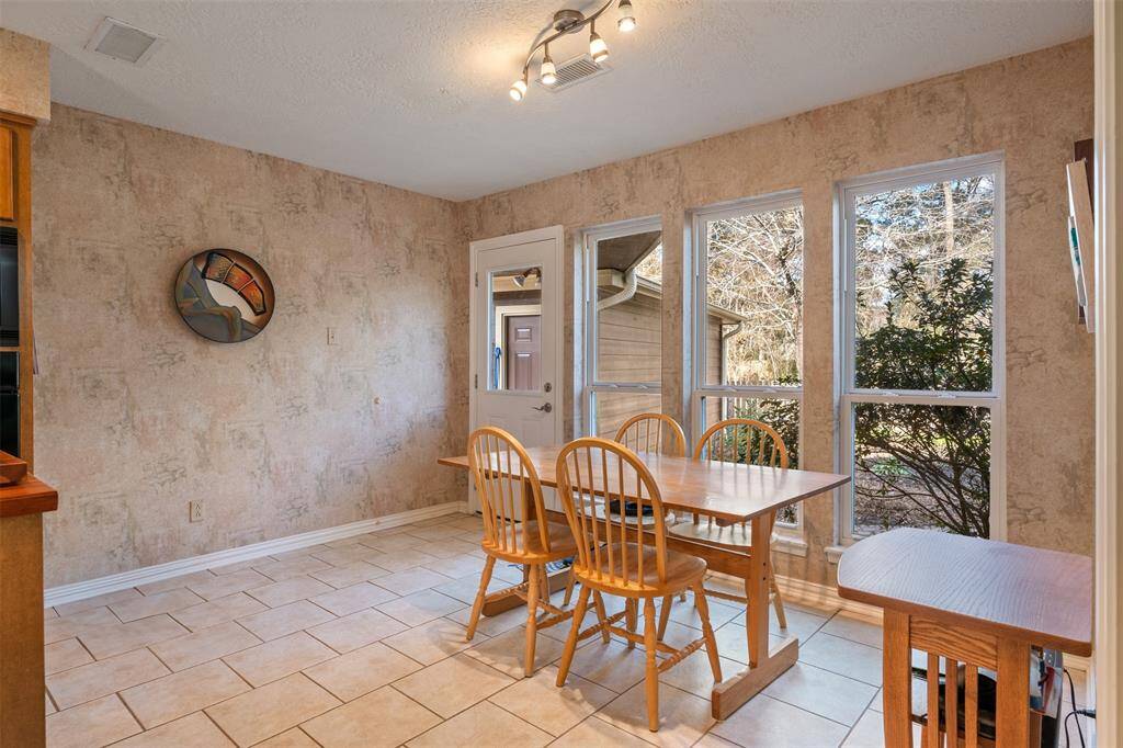 Breakfast nook area with a STUNNING view of the backyard