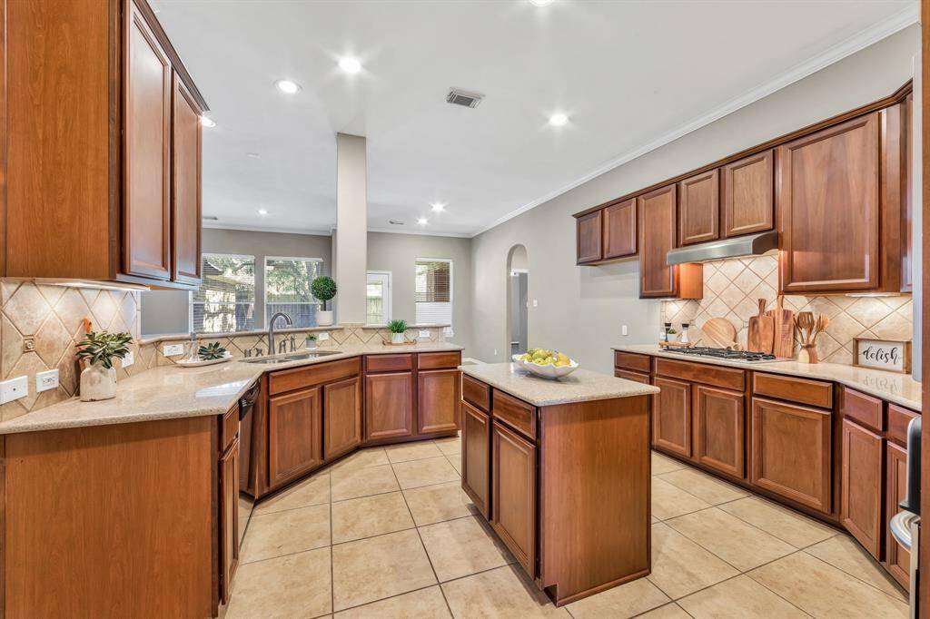 Beautiful open kitchen with island that opens to Family room.
