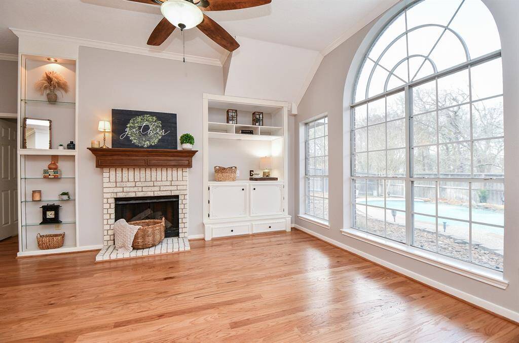 Custom built-ins and cozy fireplace.