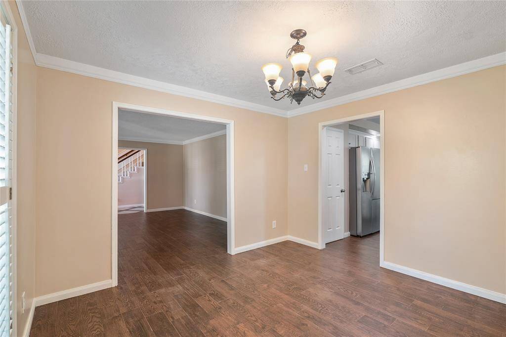 Another view of the dining room and the connecting living room.