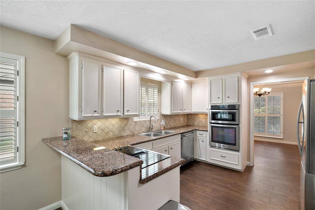 Spacious updated kitchen with easy access to dining room.