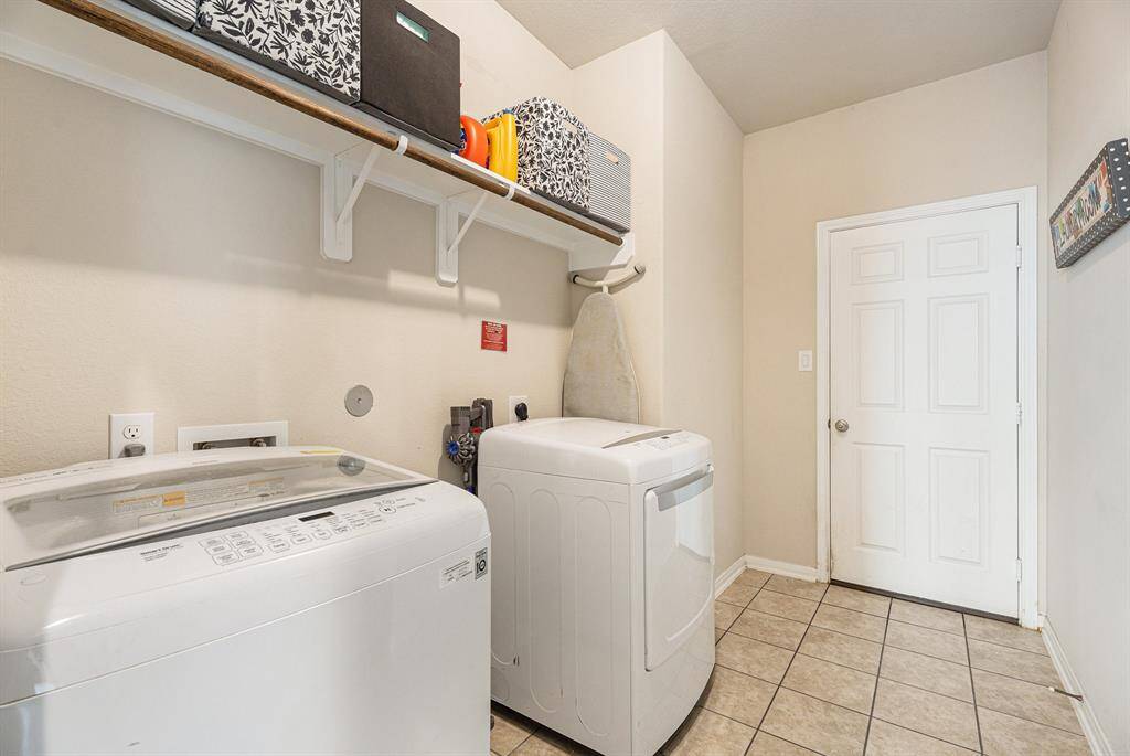 Just to the right of this photo is a bump out with room for a second refrigerator or freezer.