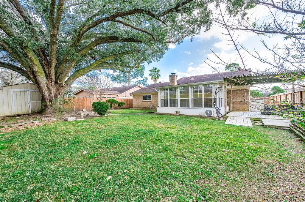 Pool Sized Back Yard with large Shed.