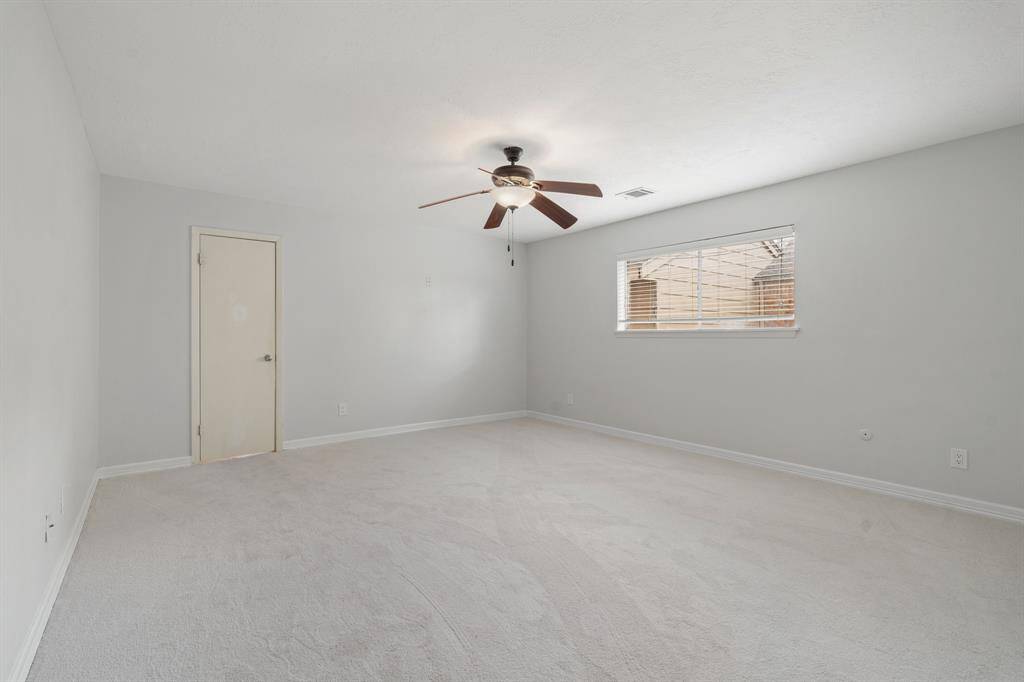 Spacious secondary bedroom on the second level.