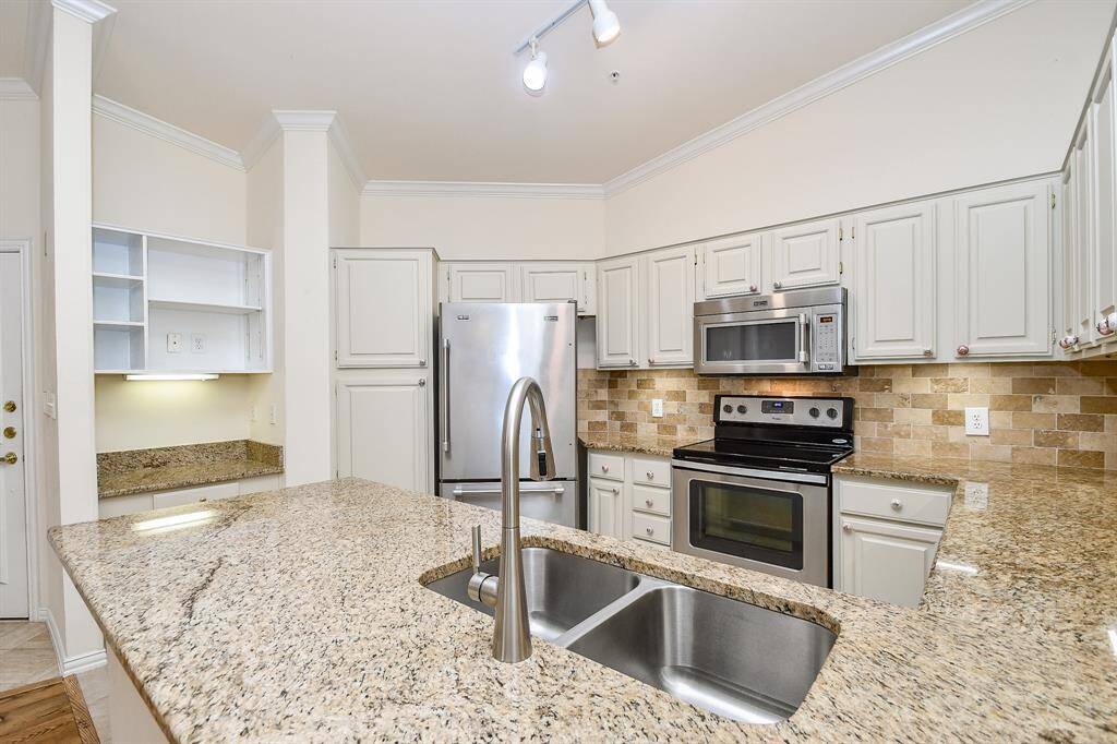 Granite Countertops W/Tile Backsplash. Frig Included.