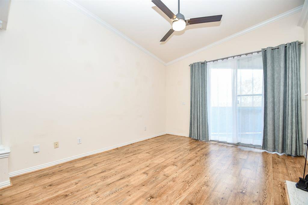 Family Room Nice Wood Floors  Leading to Patio Area