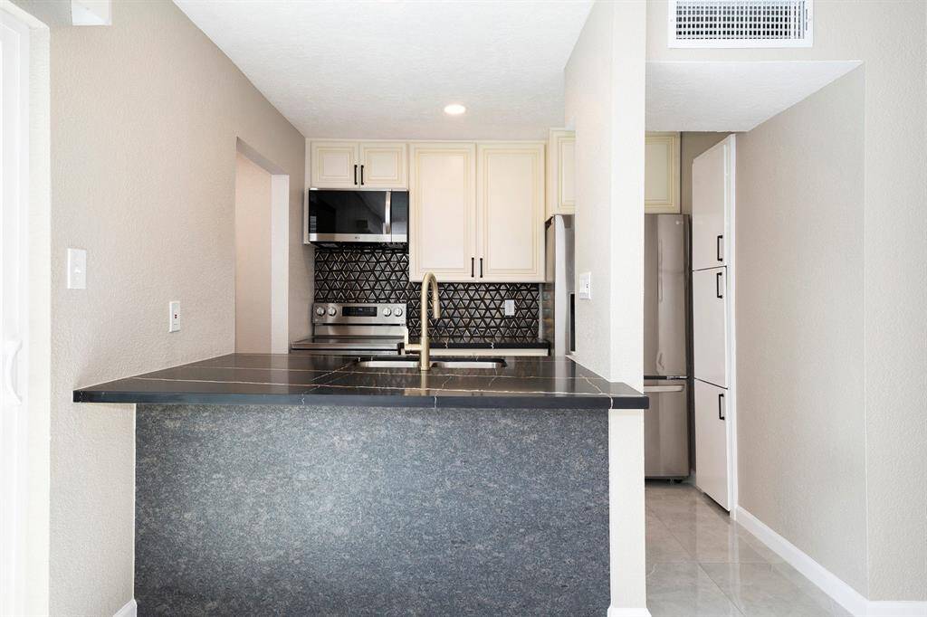 UPDATED KITCHEN WITH ALL THE MODERN TOUCHES