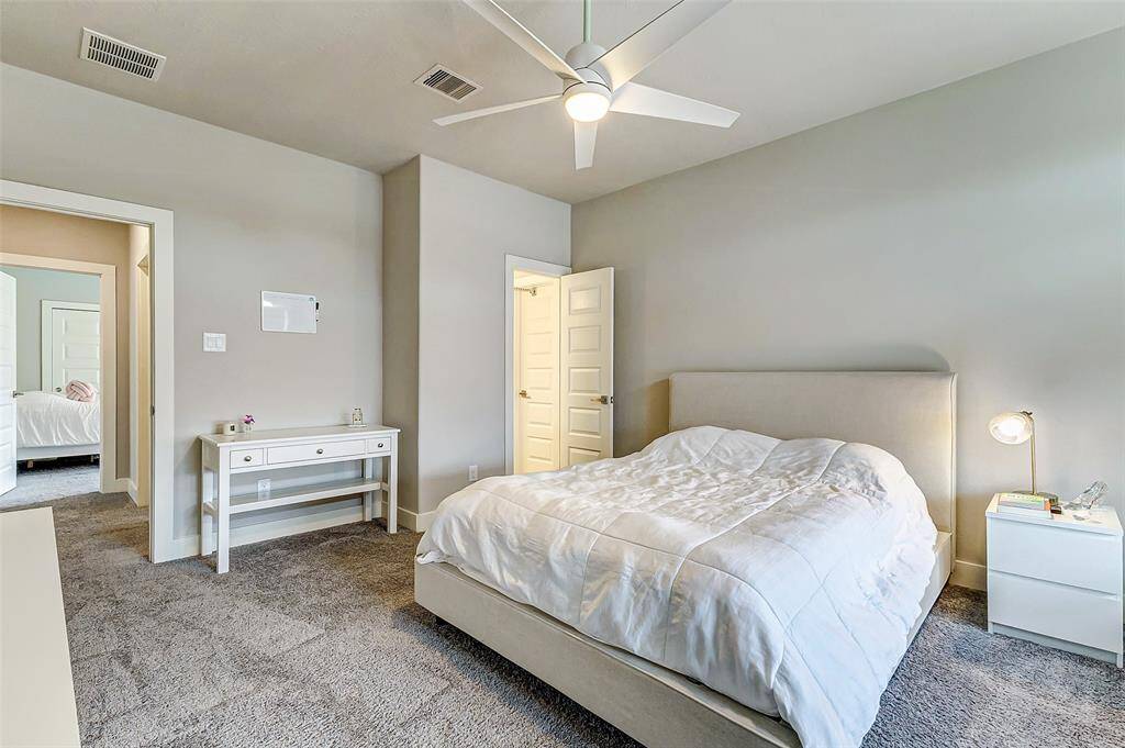 Secondary bedroom upstairs  with ceiling fan