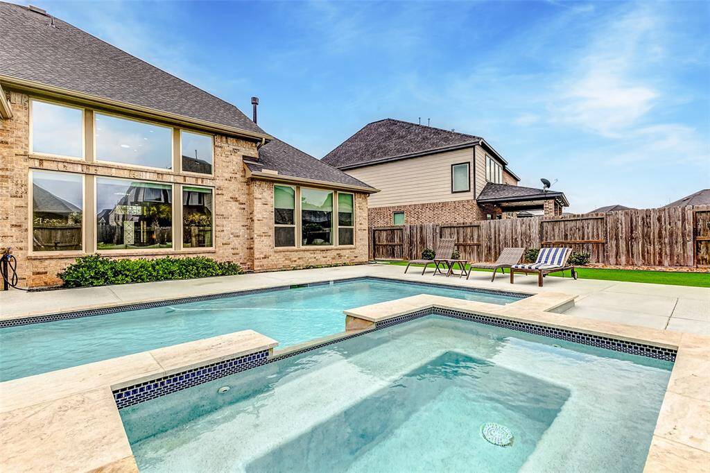 Amazing pool for outdoor entertaining with green space for your enjoyment