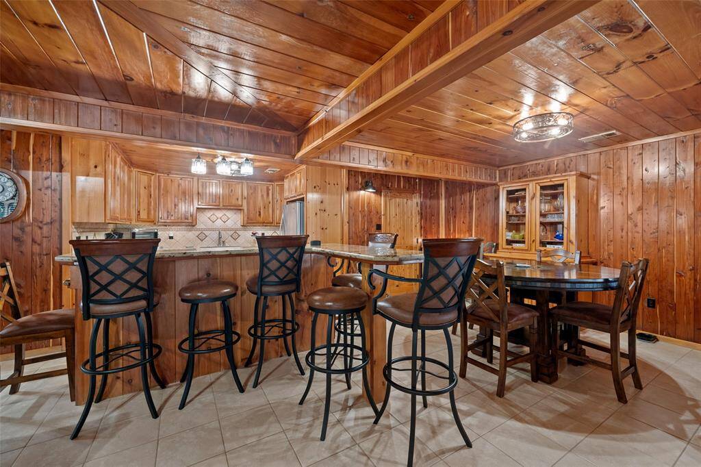 Gather together and enjoy the openness of the dining and kitchen area