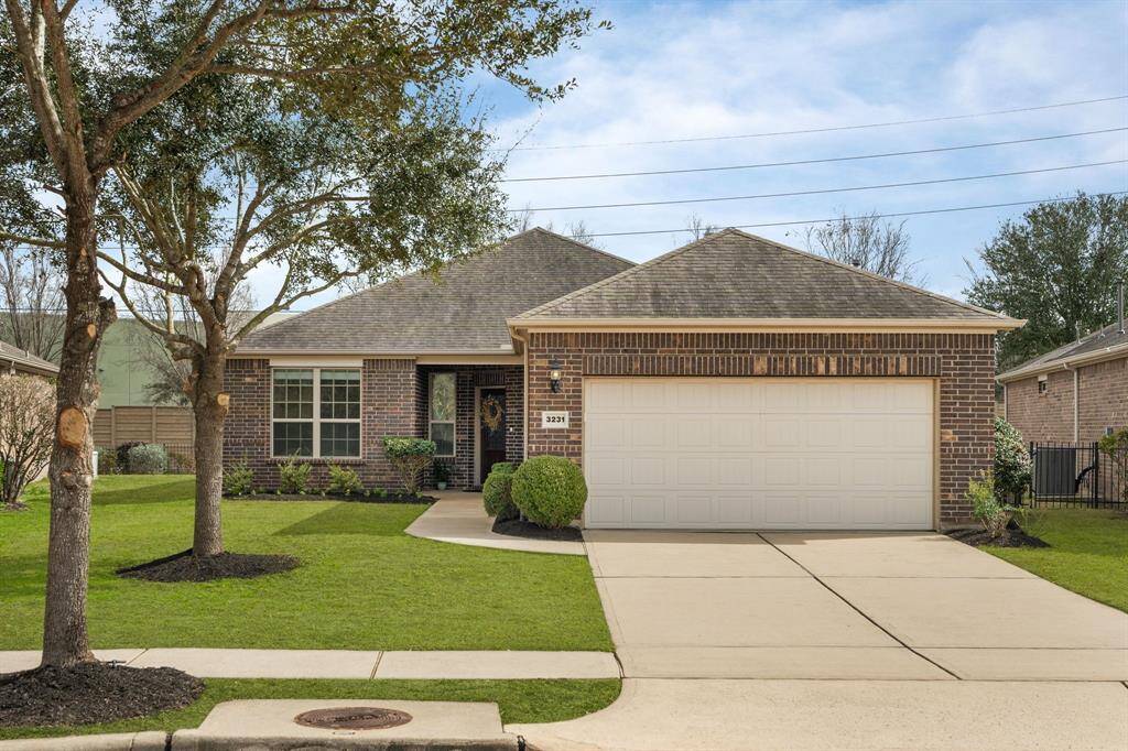 The Surrey Crest floorplan sits on a generously sized lot, providing extra space between neighbors for added privacy. New Bermuda grass will be installed once the weather improves. Please note that the grass color in this photo has been enhanced.