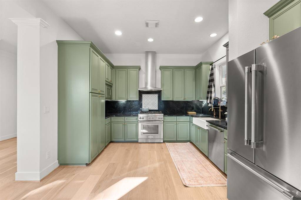 The kitchen has been recently remodeled with real soapstone countertops and backsplash, new Thermador appliances, and a farmhouse sink!