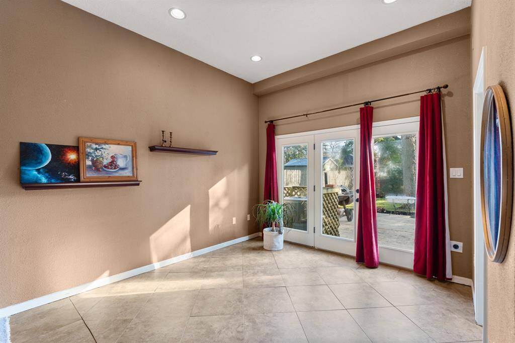 The guest house has French door access to the oversized patio, perfect for grilling and relaxing.