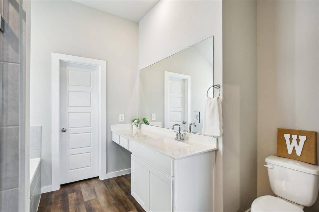 Primary bedroom with a beautiful en suite bath.