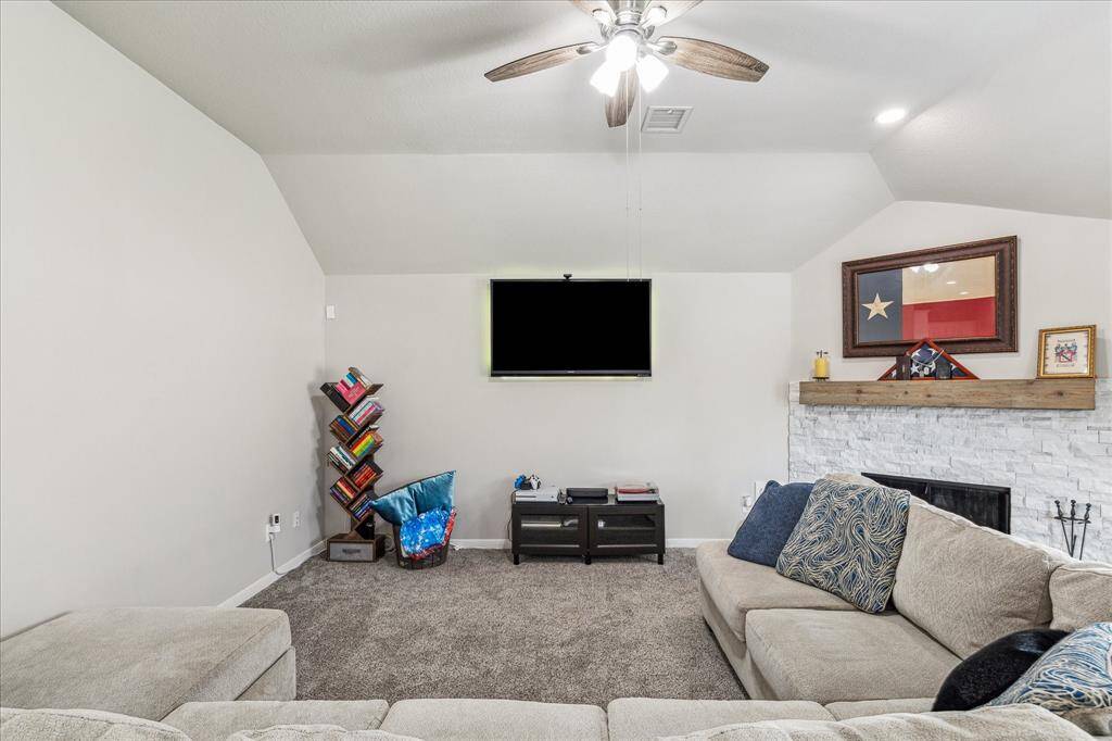 Spacious family room provides ultimate comfort for all.