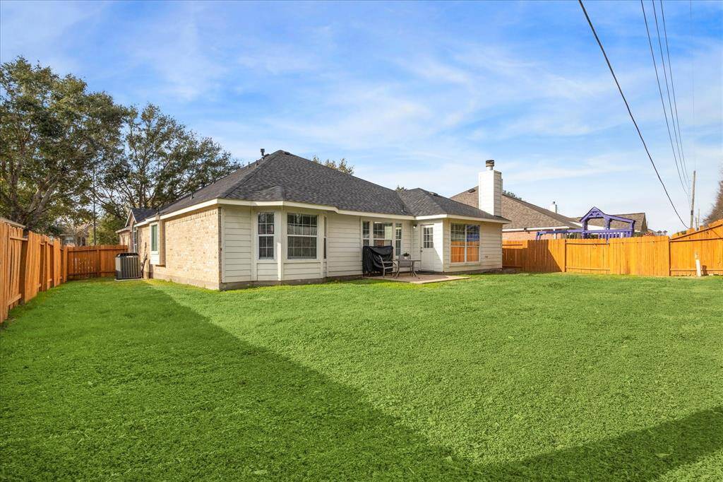 Expansive, private yard backs to wooded lot (no rear neighbors)