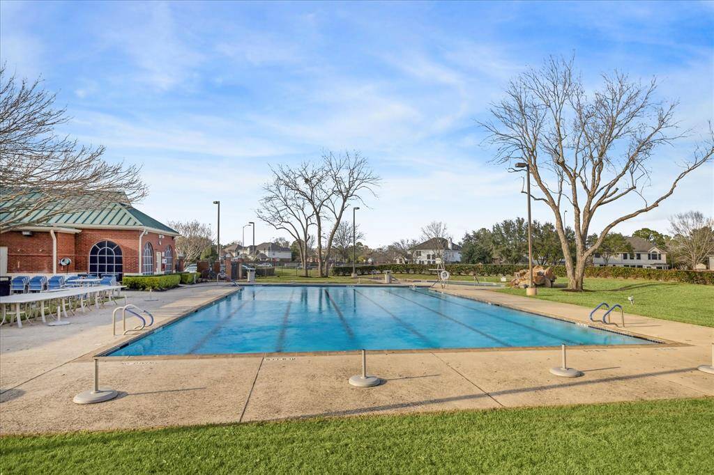 Community features an Olympic-sized pool and vibrant clubhouse with activities for residents.