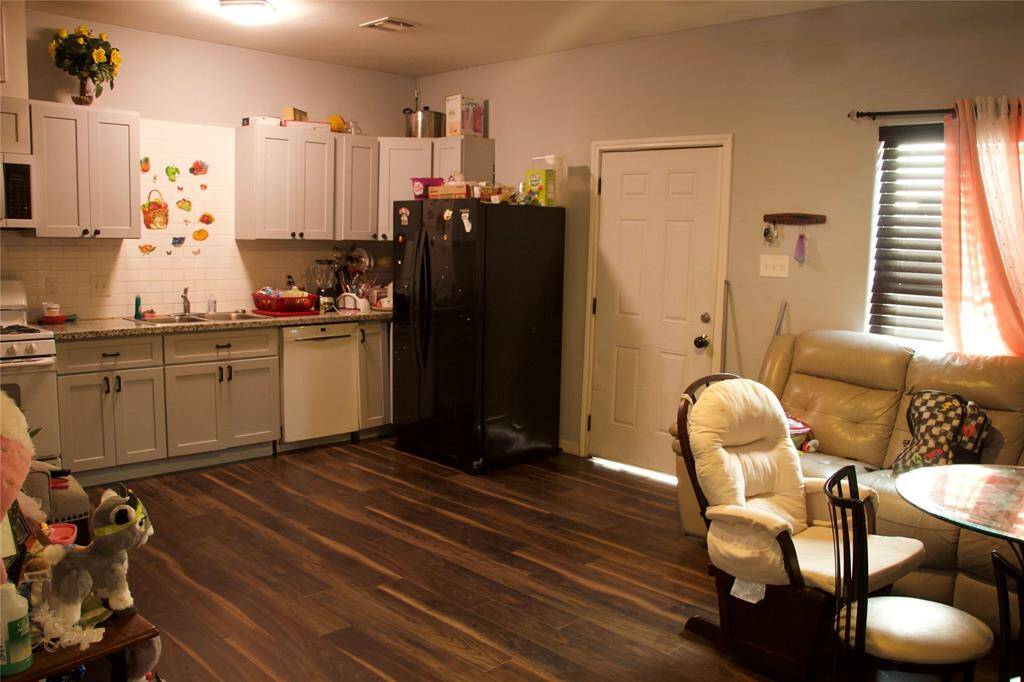 Open concept kitchen area with dining room