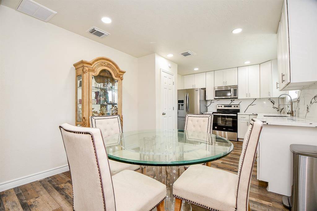 The dining and kitchen spaces are seamlessly connected.