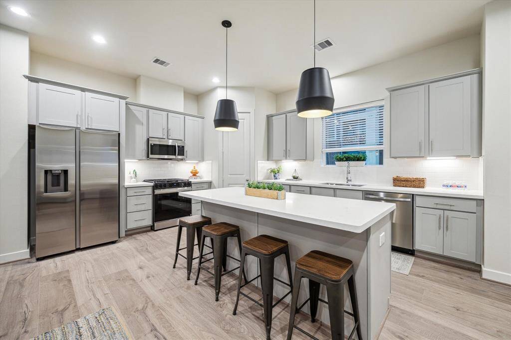 *Not of exact home, photo is of recently completed home in same community with same floor-plan & similar finishes*