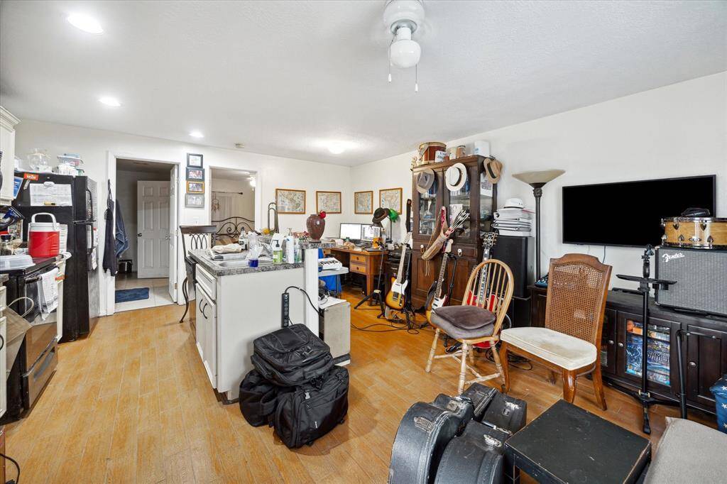 Tenant occupied garage apartment - downstairs unit.
