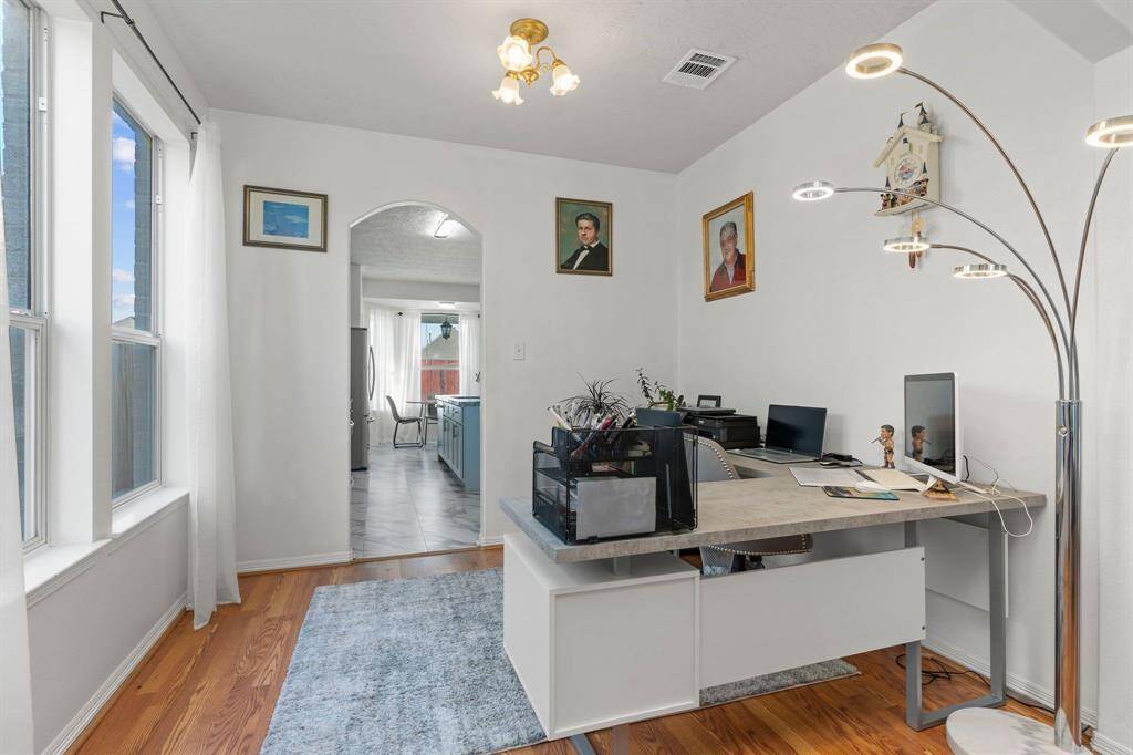 This room has been thoughtfully used as a study, with a direct entry into the gourmet kitchen, making serving and entertaining a breeze!
