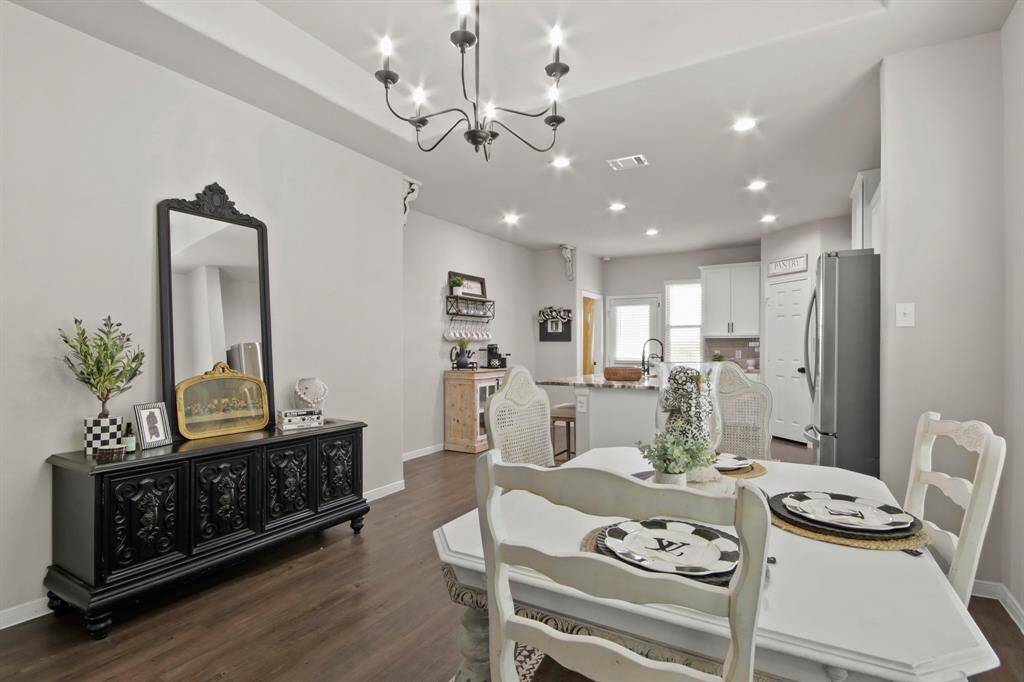 A closer view of the spacious dining area which leads into the kitchen.