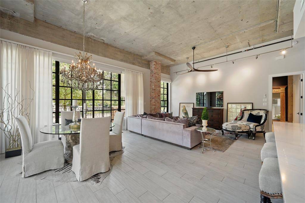 The island seamlessly connects to the adjoining space, which provides the option for a more formal/intimate dining experience, making it ideal for both relaxed get-togethers and elegant dinner parties