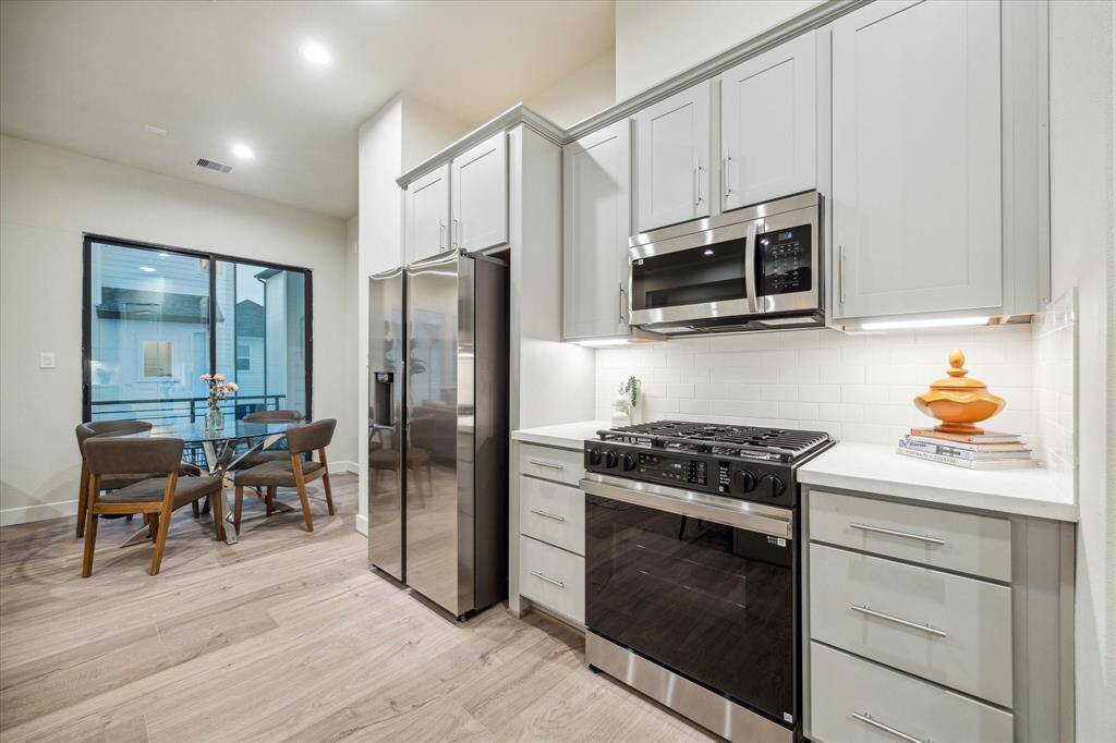 *Not of exact home, photo is of recently completed home in same community with same floor-plan & similar finishes*