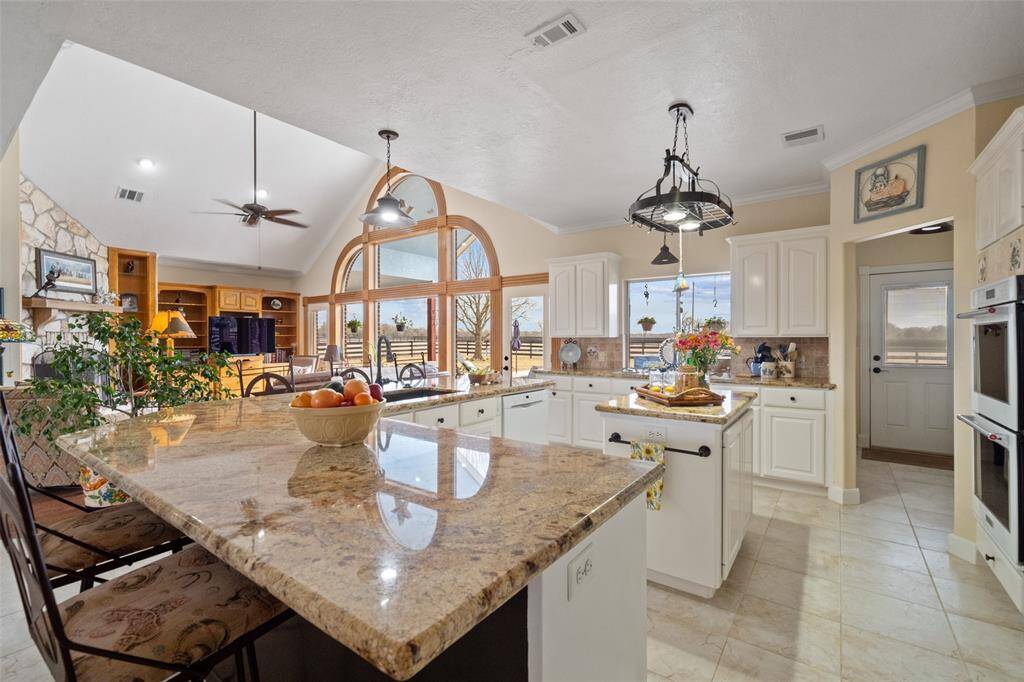 This open concept floor plan allows the family to feel connected even in separate rooms!
