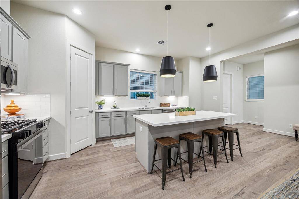 *Not of exact home, photo is of recently completed home in same community with same floor-plan & similar finishes*